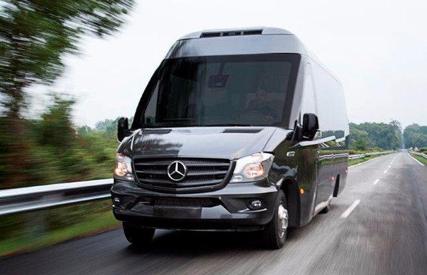 "On the road an anthracite gray Mercedes Microbus"